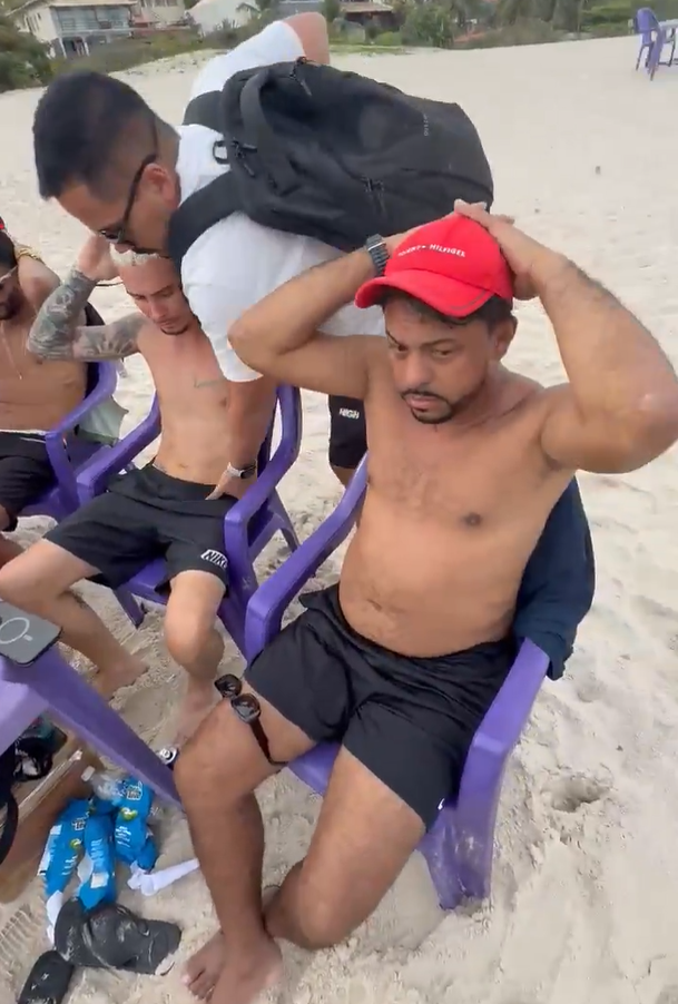 Disfarçados de banhistas, agentes prendem líder do CV bebendo whisky na praia; veja vídeo